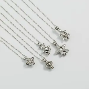 Silberfarbene Käfig-Anhänger Halsketten Set mit niedlichen Tier- und geometrischen Motiven.