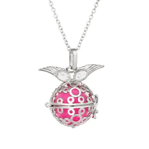Silver angel wings locket aromatherapy necklace with vibrant pink diffuser ball detail.
