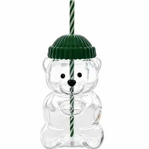 Cute bear glass cup detail view, transparent borosilicate glass with nice green lid.