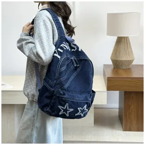 Korean style large capacity washed denim backpack for women, casual school bag with stars.
