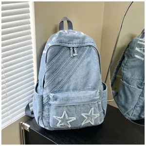 Korean style large capacity washed denim canvas backpack for women school bag daily use.