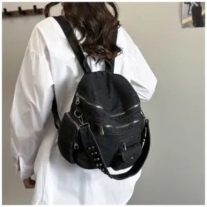 Black denim backpack for women, vintage multi-pocket casual school bag and crossbody daily use.