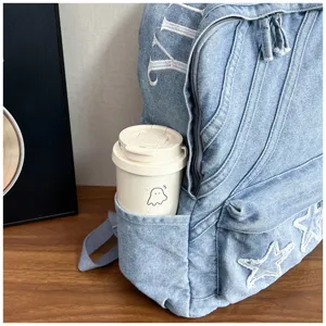 Korean style large capacity washed denim backpack for women with star embroidery details