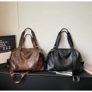 Large capacity PU leather travel duffel bag, casual shoulder crossbody bag for short trips.