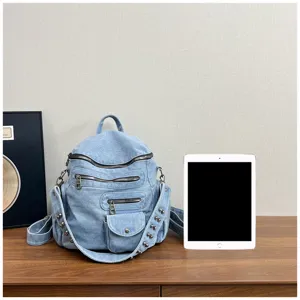 Casual denim backpack for women, multi-pocket retro school bag, stylish college daypack.