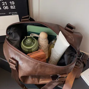 Large capacity PU leather travel duffel bag for casual outdoor trips, shoulder and crossbody.
