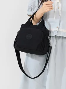 Sac bandoulière femme en nylon noir multi-poches sac à main décontracté vue détaillée.