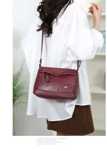 Details of the vintage soft leather women shoulder bag, showing large capacity and fine texture.