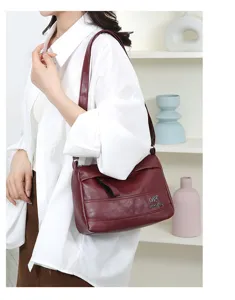 Soft leather shoulder bag detail, wine red large capacity daily casual crossbody purse.