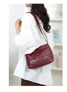 Detailed view of the women vintage soft leather shoulder bag with spacious design and strap.