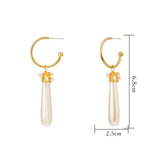 Detailed view of handmade copper wire faux pearl hoop earrings, size 6.8cm x 2.5cm.