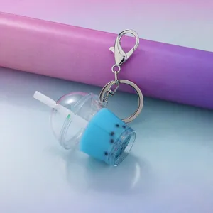 Cute acrylic pearl milk tea keychain detail view, charming bag charm and accessory for summer.