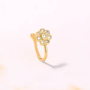 Anello da naso a fiore dorato con zircone brillante, elegante accesorio per piercing.