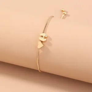 Gold letter H charm box chain bracelet detail view with adjustable bead and crystal.