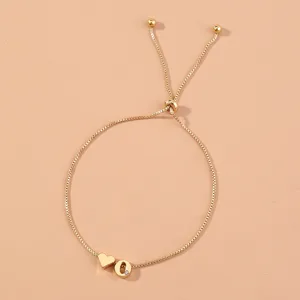 Gold box chain bracelet with heart and letter Q charm, featuring an adjustable slider design.
