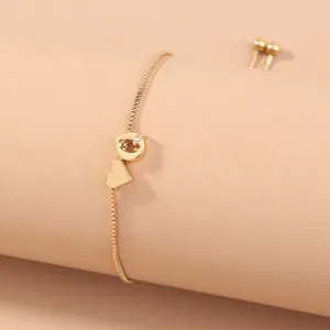 Gold box chain bracelet with heart and letter pendant, adjustable slider copper bead design.