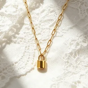 Gold paperclip chain necklace with mini solid padlock pendant, elegant clavicle chain.