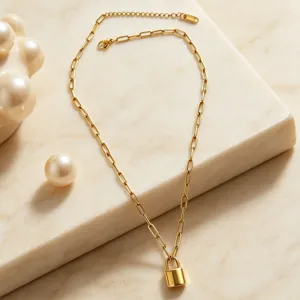 Details of the 18k gold titanium steel padlock pendant necklace, minimalist clavicle chain.