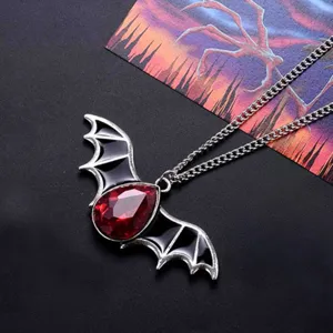 Gothic vampire bat wing necklace with red teardrop gem for Halloween party and cosplay.