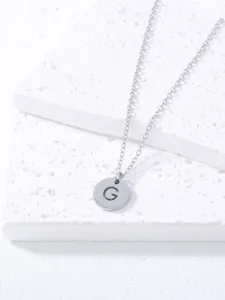 Stainless steel initial letter G pendant necklace detailed view minimalist jewelry for women.