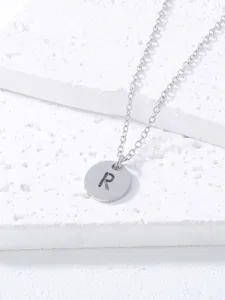 Stainless steel letter R pendant necklace detail closeup view shiny silver finish