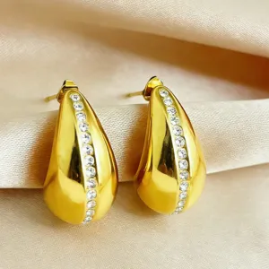 Gold plated titanium steel teardrop stud earrings with sparkling rhinestones for women.