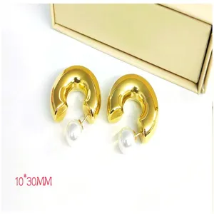Chunky gold C-shaped hoop earrings with elegant back pearl design, 10x30mm stainless steel.
