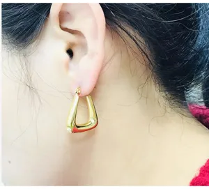 Minimalist 18k gold plated stainless steel geometric V-shaped hoop earrings for daily wear.