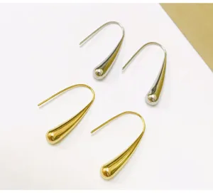 Stainless steel teardrop earrings detail view, elegant metal drop design in gold and silver.