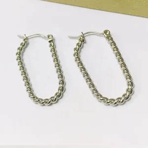 Simple fashion wide twist hoop earrings stainless steel metal geometric jewelry main view