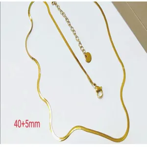 Stainless steel gold herringbone chain necklace closeup detail, adjustable length 40+5mm design.