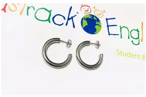 Thick silver C-shaped hoop earrings, minimalist punk style metal fashion jewelry for women.