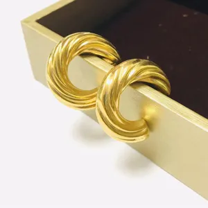 French style chunky twisted gold hoop earrings for women, stylish wave metal jewelry.