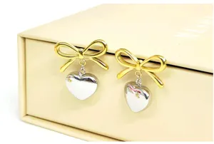 French court style bow heart drop earrings, dual-tone gold and silver stainless steel jewelry.