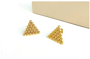 Elegant golden triangular beaded stud earrings, minimalist geometric jewelry in polished finish.