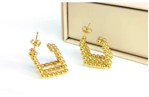 Gold multi-layer beaded hoop earrings, stylish geometric metal jewelry for women daily wear.