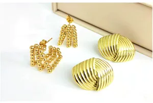Gold stainless steel statement earrings detail, stylish metal geometric stud earrings combo.