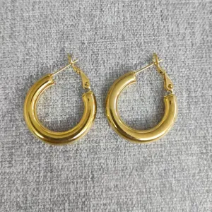 Classic minimalist chunky gold hoop earrings for women, stylish everyday jewelry accessories.