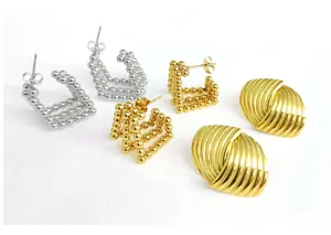 Exquisite stainless steel beaded square hoop earrings and gold oval stud set details.