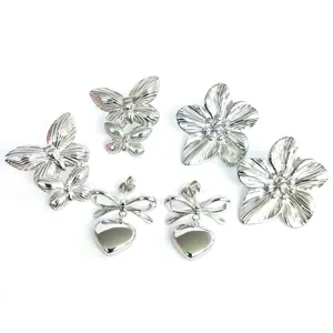 French style stainless steel earrings set featuring butterfly, five-petal flower and bow heart.