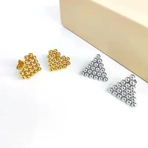 Chic beaded heart and triangle stud earrings in gold and silver, modern metal jewelry.