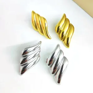 Chic minimalist gold and silver metal earrings set, elegant geometric design for women.