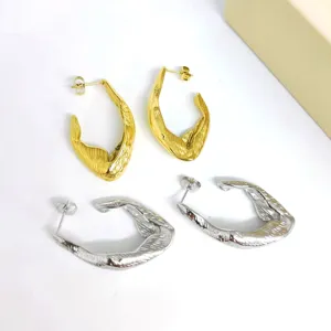 Irregular twisted hoop earrings set, stainless steel gold and silver metal fashion jewelry main view.