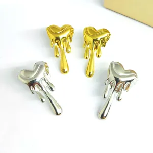 Stainless steel geometric melting heart earrings, trendy gold and silver fashion jewelry studs.