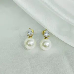 Elegant teardrop zircon and faux pearl earrings, stylish gold-tone finish for women's daily wear.