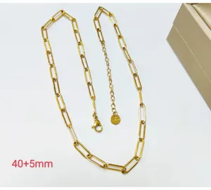 Detailed close-up view of the 18k gold plated stainless steel paperclip chain necklace with extension.