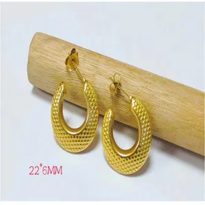 Gold plated stainless steel textured crescent hoop earrings for women fashion jewelry.