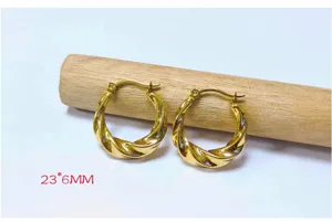 Gold twisted hoop earrings detail shot, stainless steel 18k gold plated jewelry close up