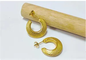 Detailed shot of 18k gold plated stainless steel textured chunky half hoop earrings.