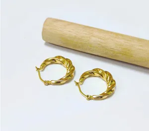 18K gold plated stainless steel twisted hoop earrings, elegant crescent detail view.